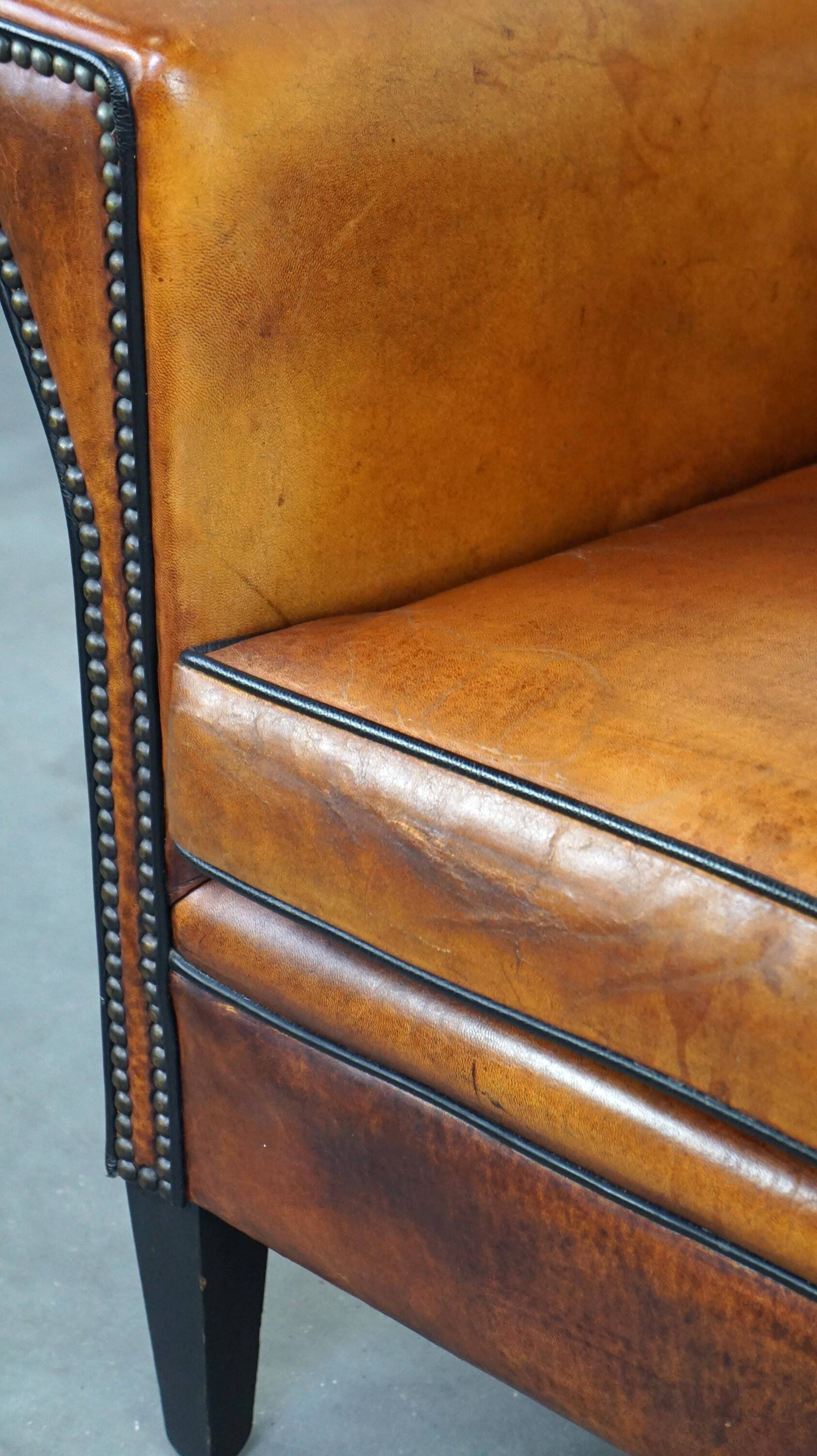 Sleek sheepskin Art Deco design armchair with beautiful details