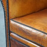Sleek sheepskin Art Deco design armchair with beautiful details