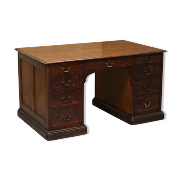 Double-sided partner desk with two Gillows Lancaster cabinets in mottled oak.