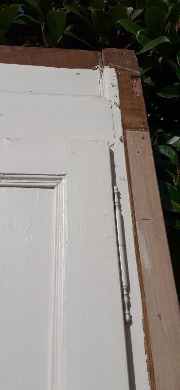 Pair of 19th-century cupboard doors and frame, woodwork