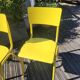 Pair of yellow plywood chairs