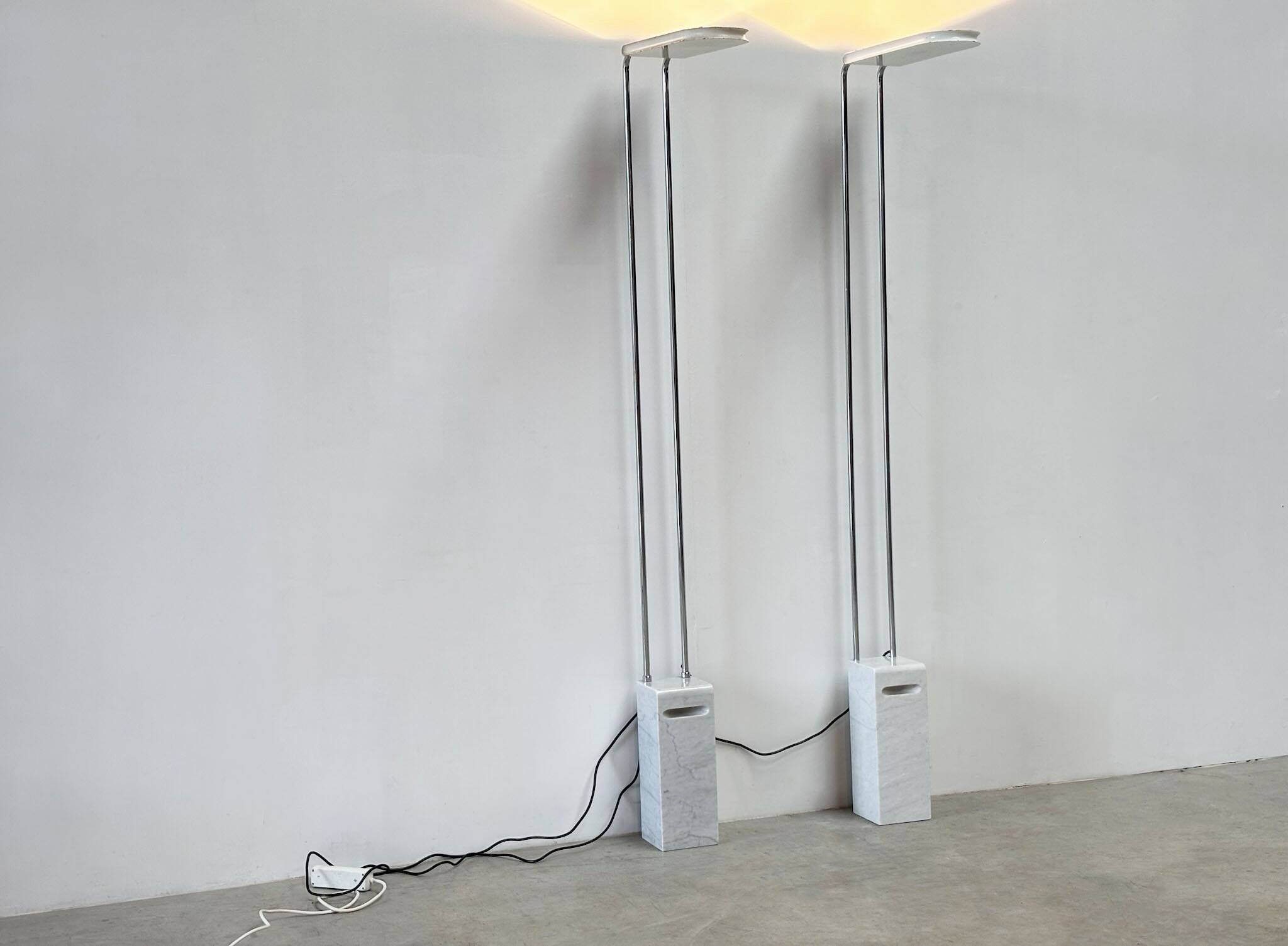 Pair of Skipper floor lamps by Bruno Gecchelin