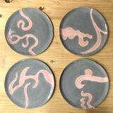 Set of 4 gray plates with rose patterns
