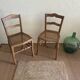 Set of two antique chairs with caning.