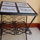 Small square coffee table in wrought iron.