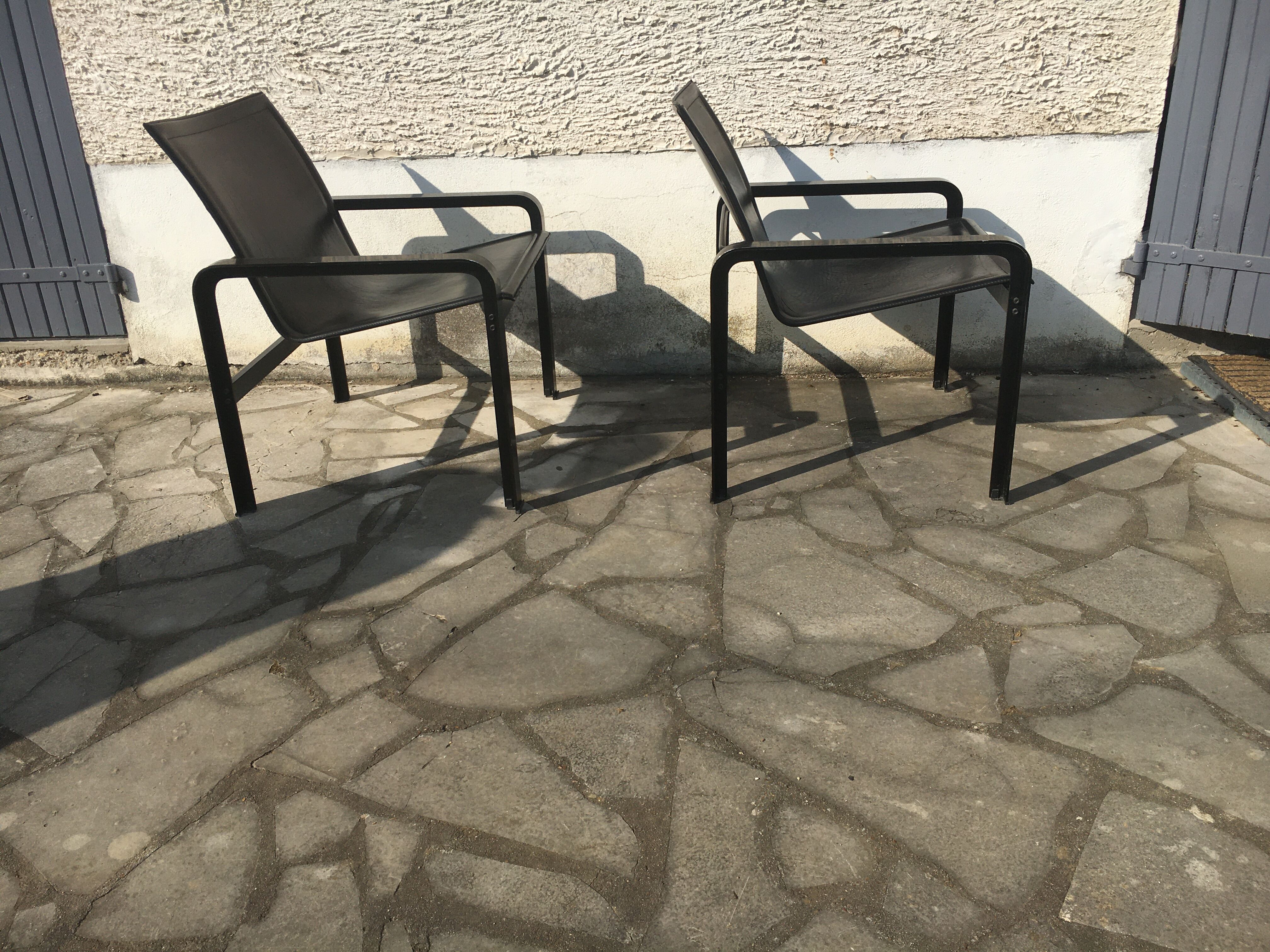 Pair of leather and metal chairs 70s