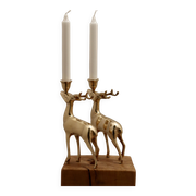 Pair of brass candle holders in the shape of deer from the mid-century.