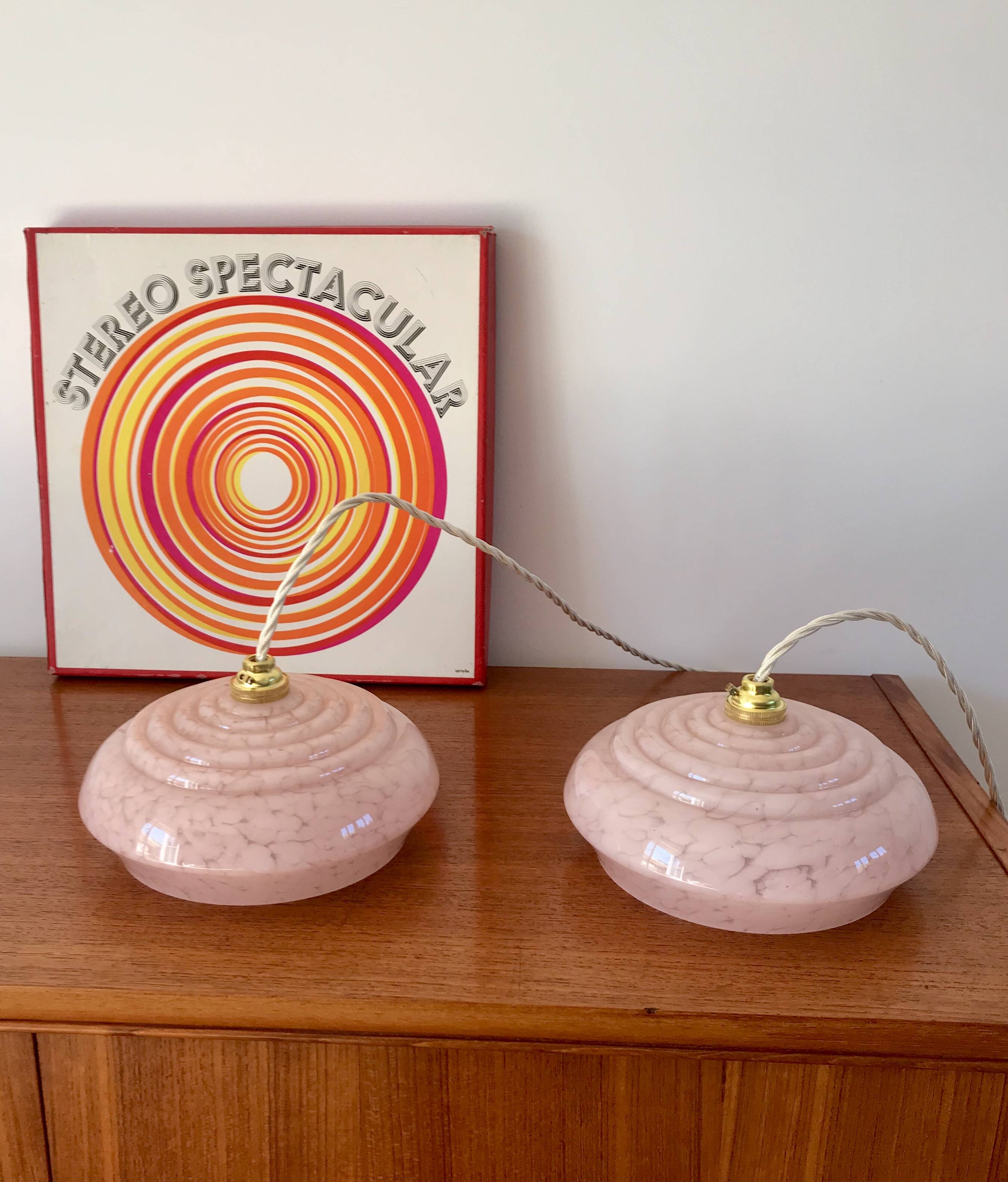 pair of candy pink Clichy glass pendant lights from the 1950s