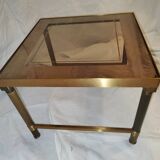 Small table or side table with brass structure and glass top from the 1970s.