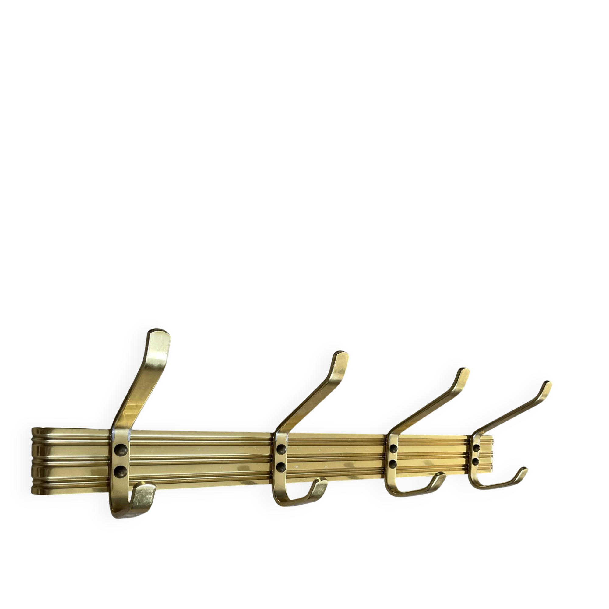Golden wall-mounted coat rack from the 70s.