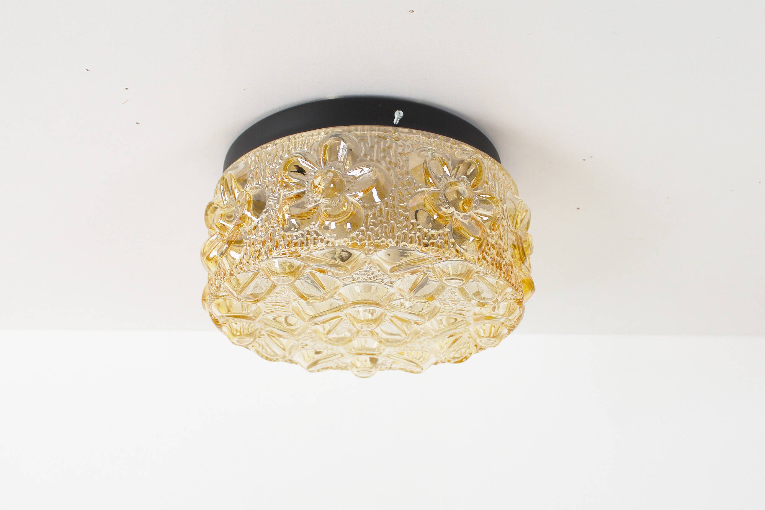 Original 1970’s amber Glass ‘Flower’ wall lamps by Erco