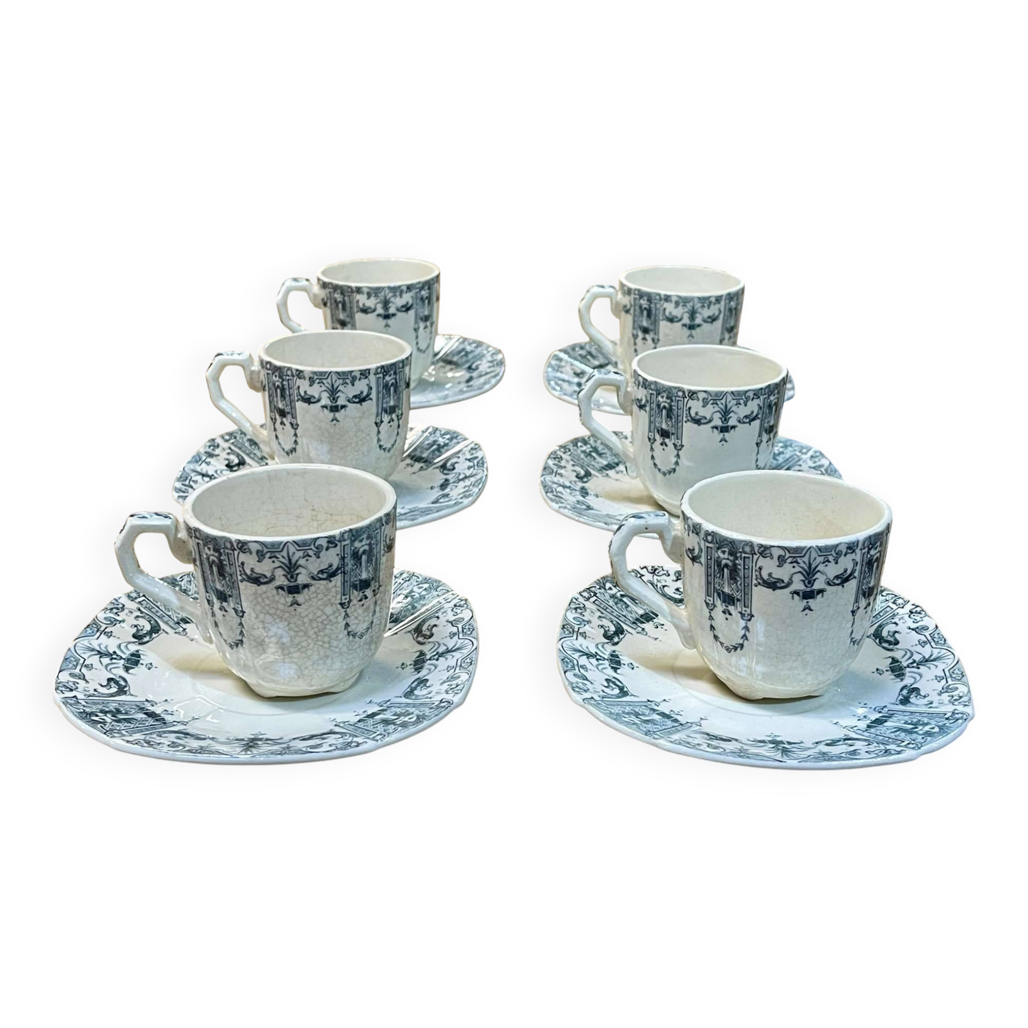 6 cups and saucers in Gien earthenware with Mascaron decoration from the early 20th century.