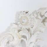 Rocaille style headboard, in carved and lacquered wood. Circa 1900.
