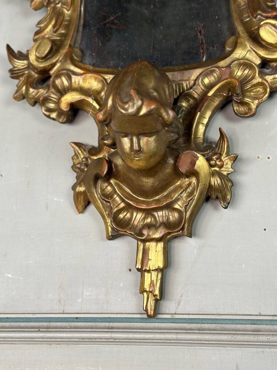 Pair of carved and gilded wooden mirrors, Italy 19th century