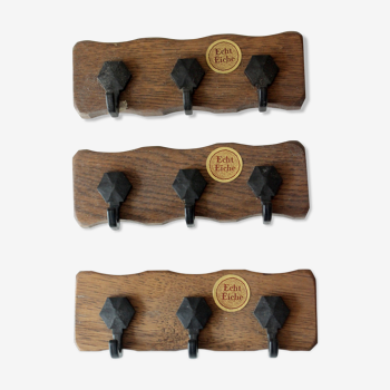 Set with 3  solid wooden coat racks each with 3 plastic coat hooks, vintage from the 1970s