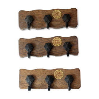 Set with 3  solid wooden coat racks each with 3 plastic coat hooks, vintage from the 1970s