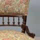 Victorian armchair with fabric pouf, England, 19th century.