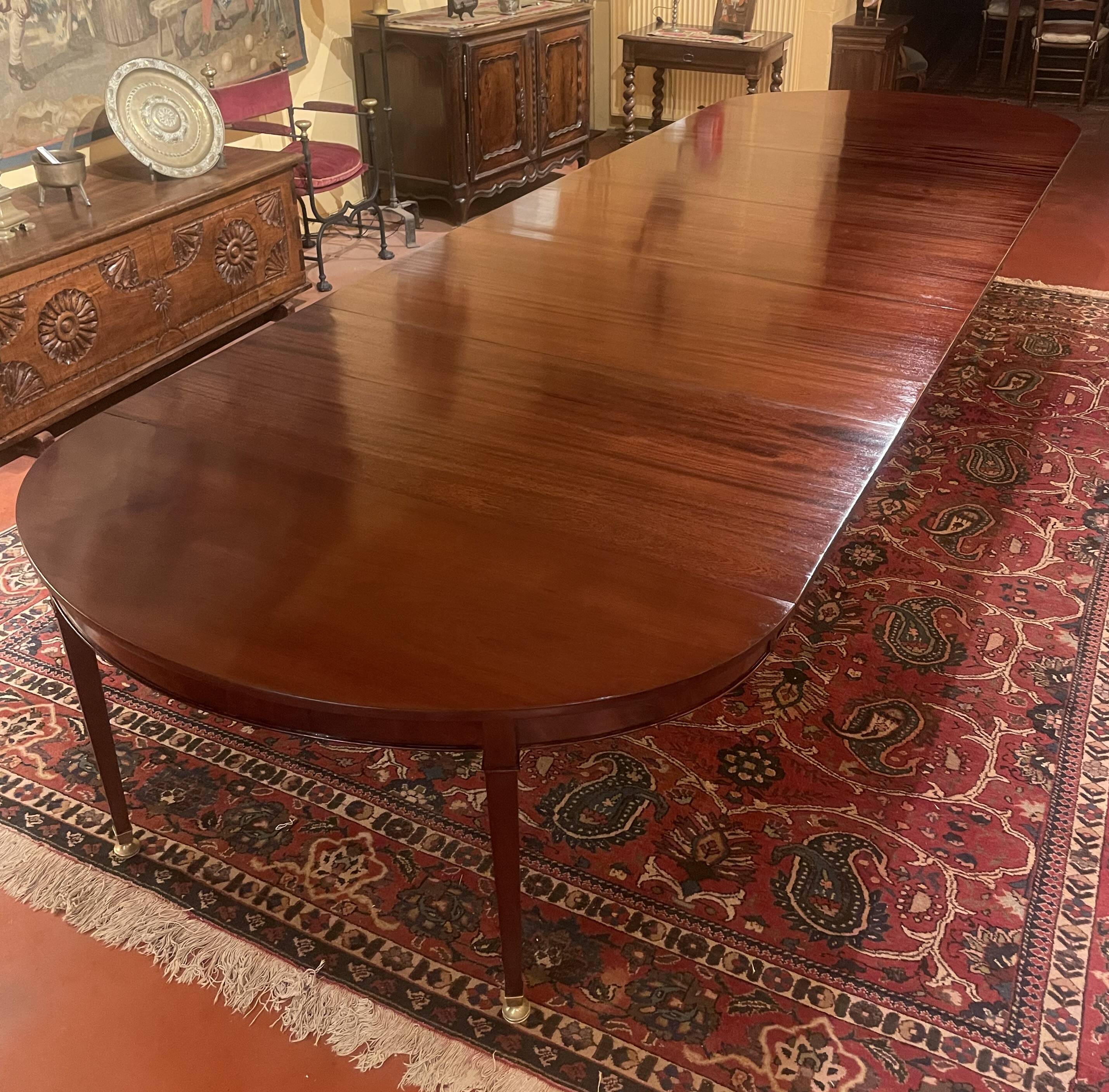 Extensible Louis XVI dining table in period Directoire mahogany.