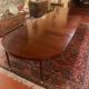 Extensible Louis XVI dining table in period Directoire mahogany.