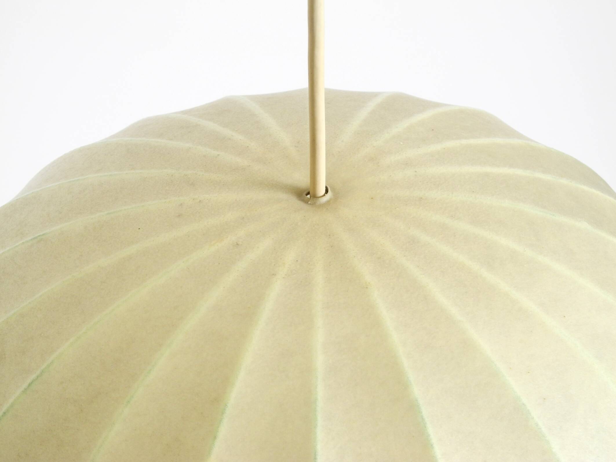 Beautiful Cocoon pendant lamp in very good vintage condition from the 1960s