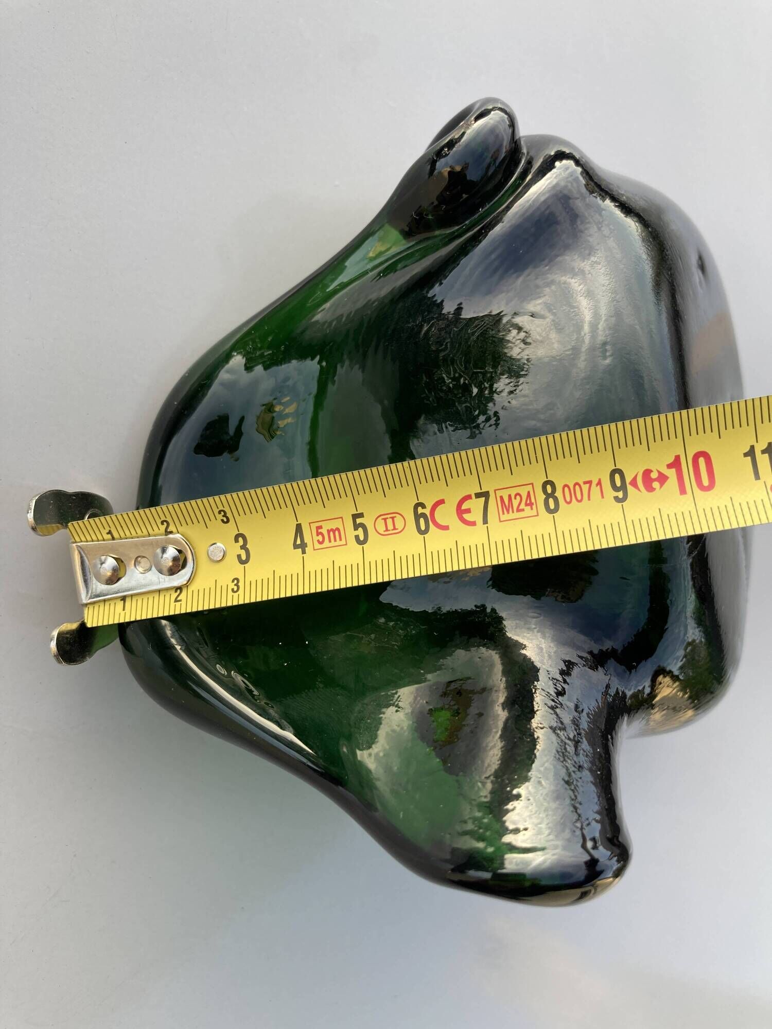 Sculptural ashtray in emerald green glass