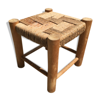 Wooden stool seated in braided rope