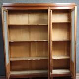 Large pine bookcase with three doors, fitted with frosted glass.