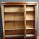 Large pine bookcase with three doors, fitted with frosted glass.