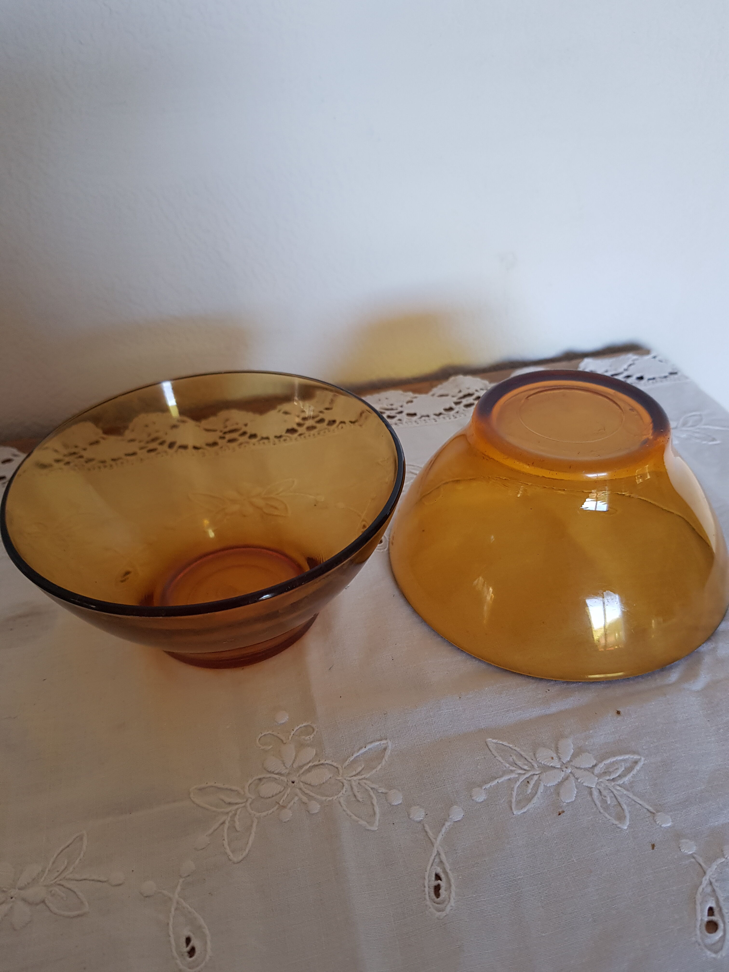 Duo of amber bowls