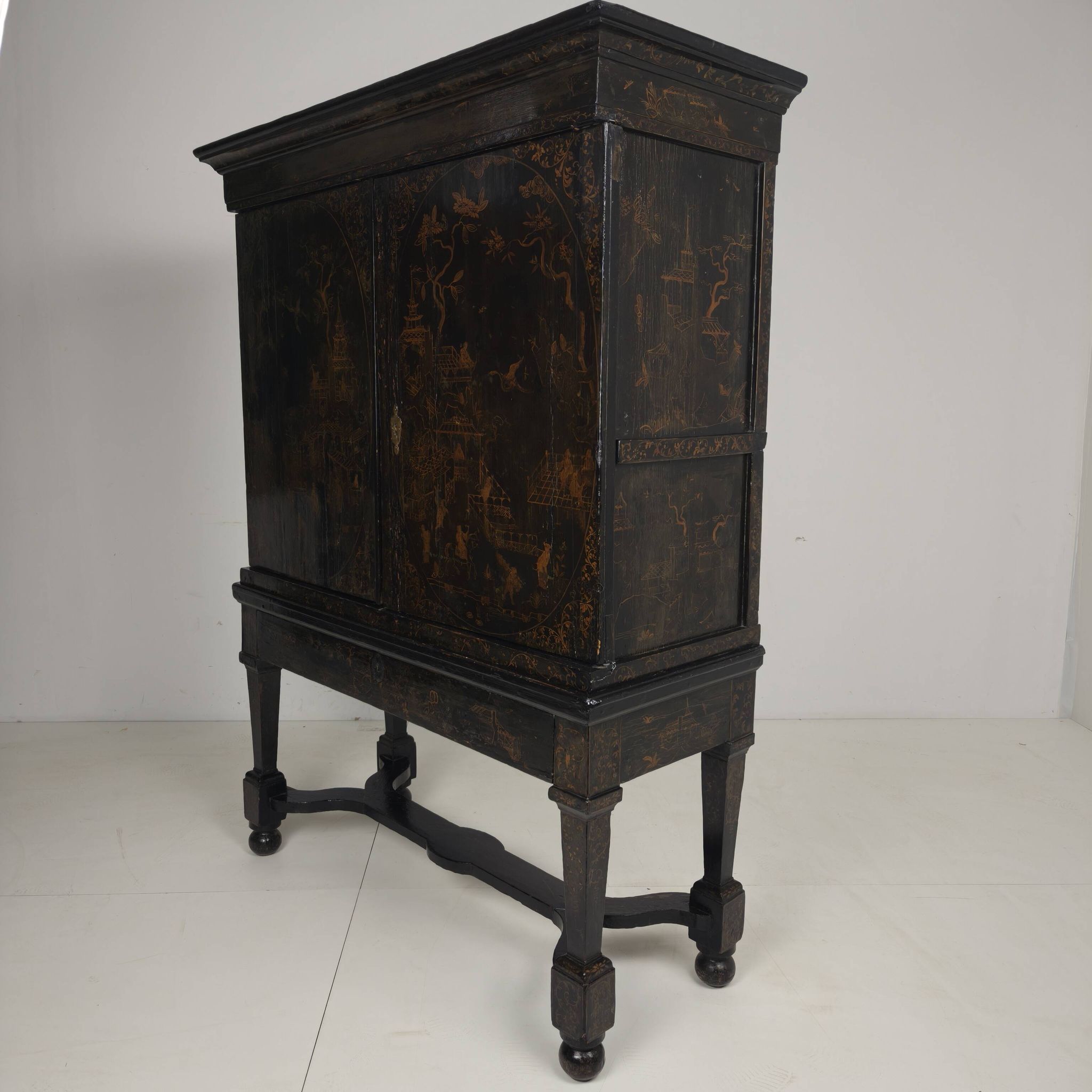 A rare early 18th-century Dutch japanned chinoiserie cabinet, circa 1700