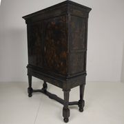 A rare early 18th-century Dutch japanned chinoiserie cabinet, circa 1700