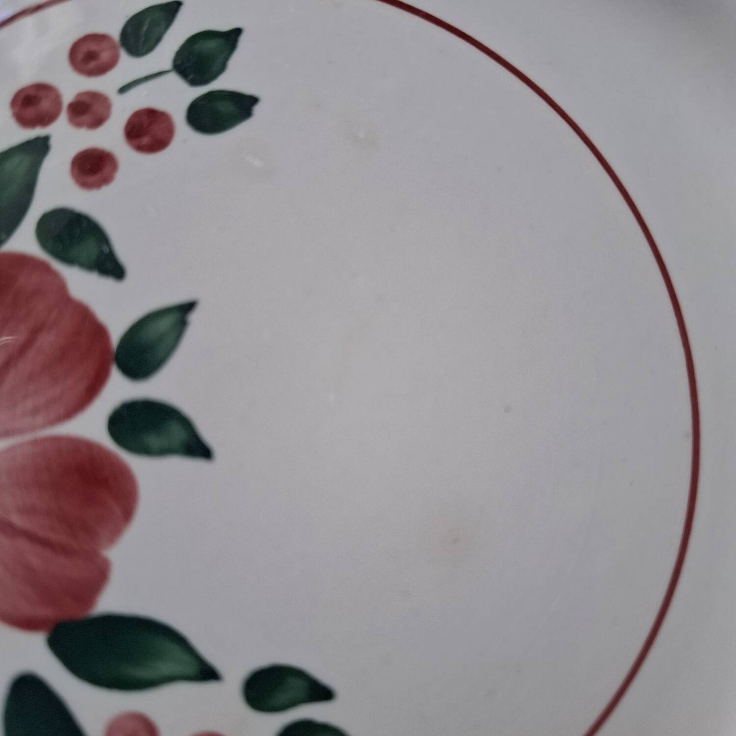 Old mismatched earthenware dinner plates