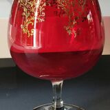Vase in the shape of a footed cup, in bohemian crystal. ruby color. scroll & floral design with 24 c gold highlights