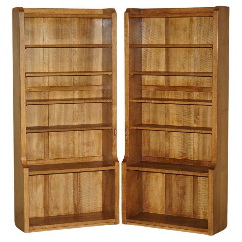 Pair of Robert Mouseman Thompson oak carved bookshelves.