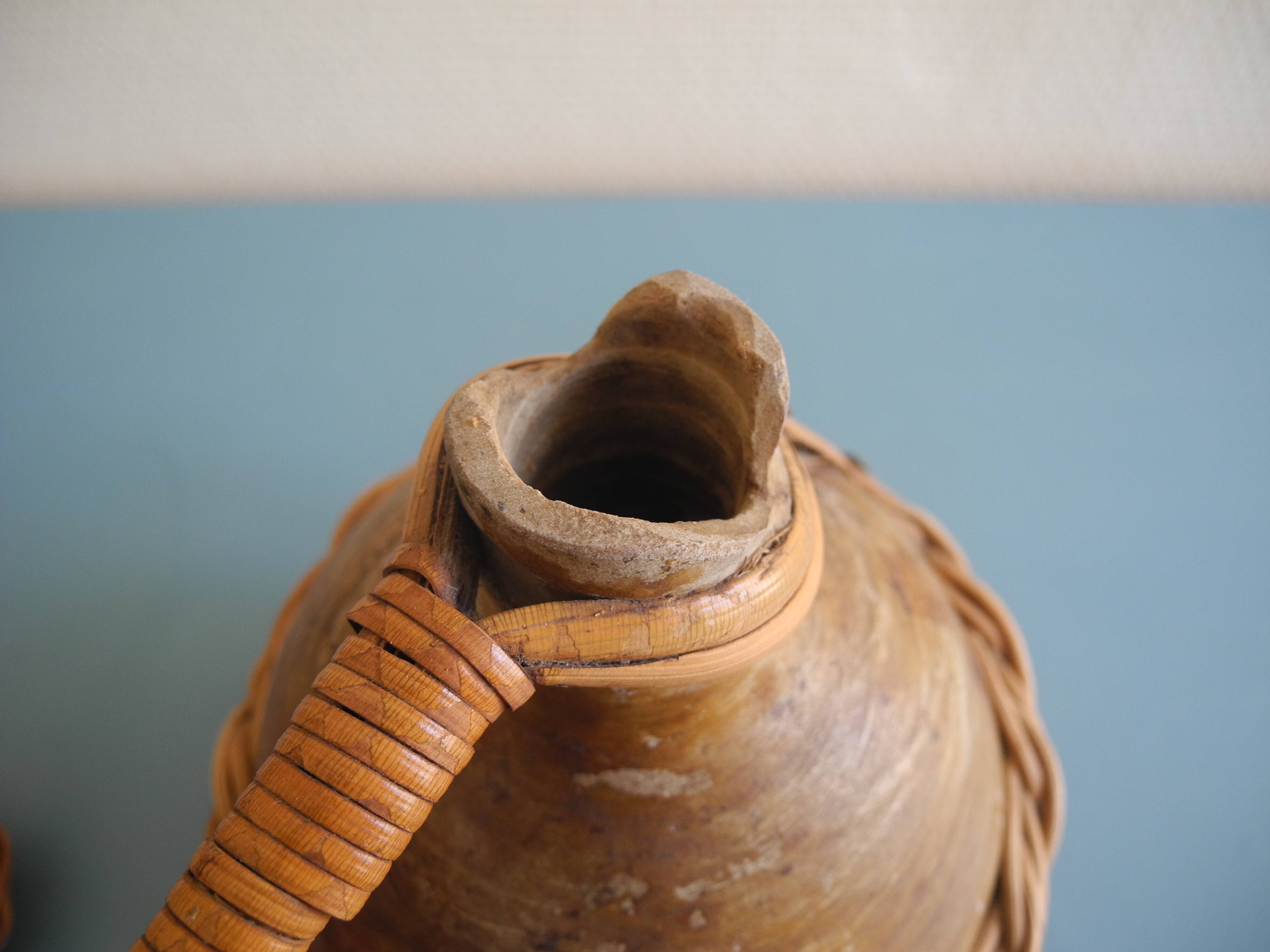 old stoneware bottle wicker vintage decoration stoneware bottle wicker