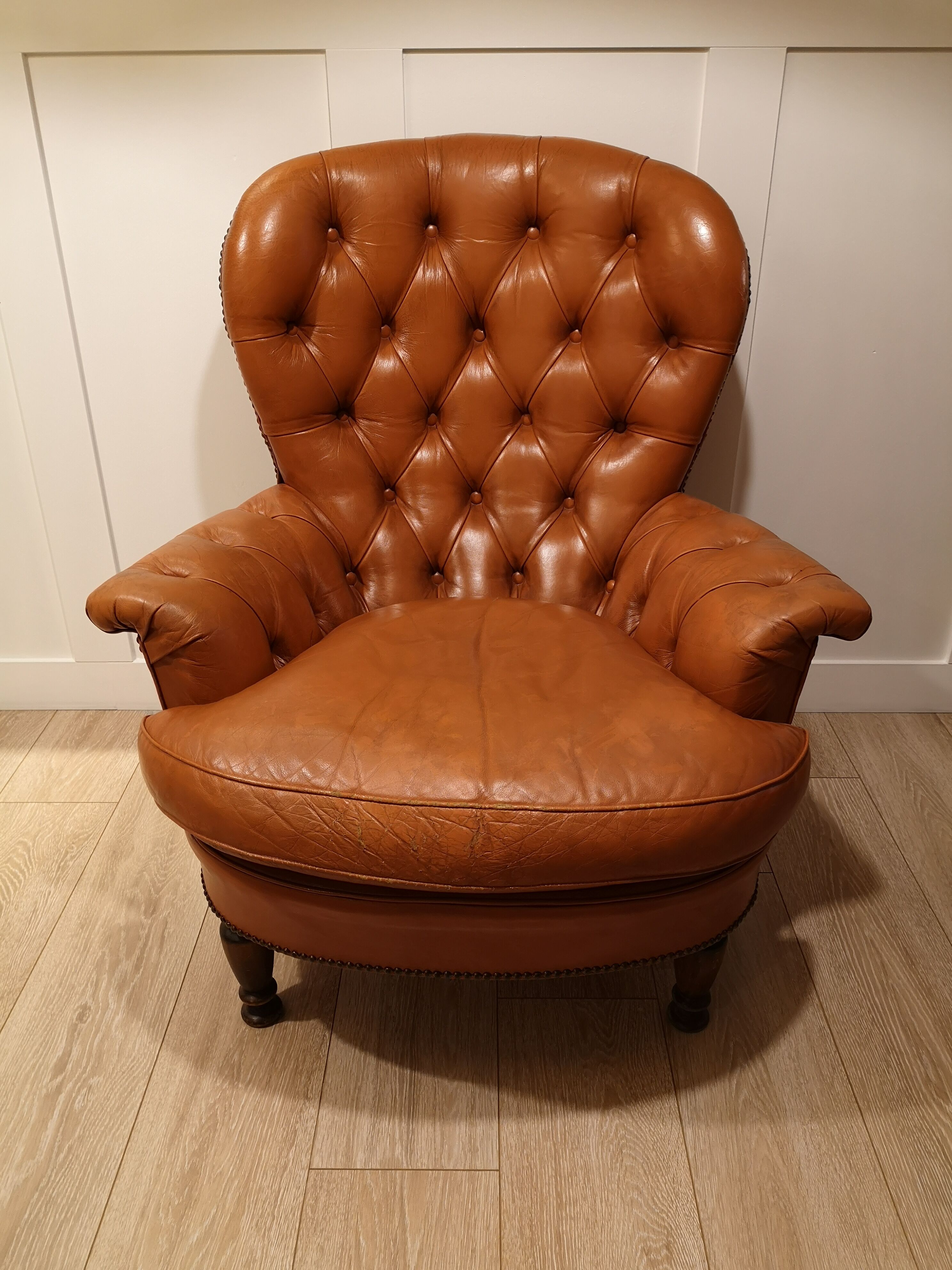 Pair of leather chesterfield chairs