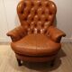 Pair of leather chesterfield chairs