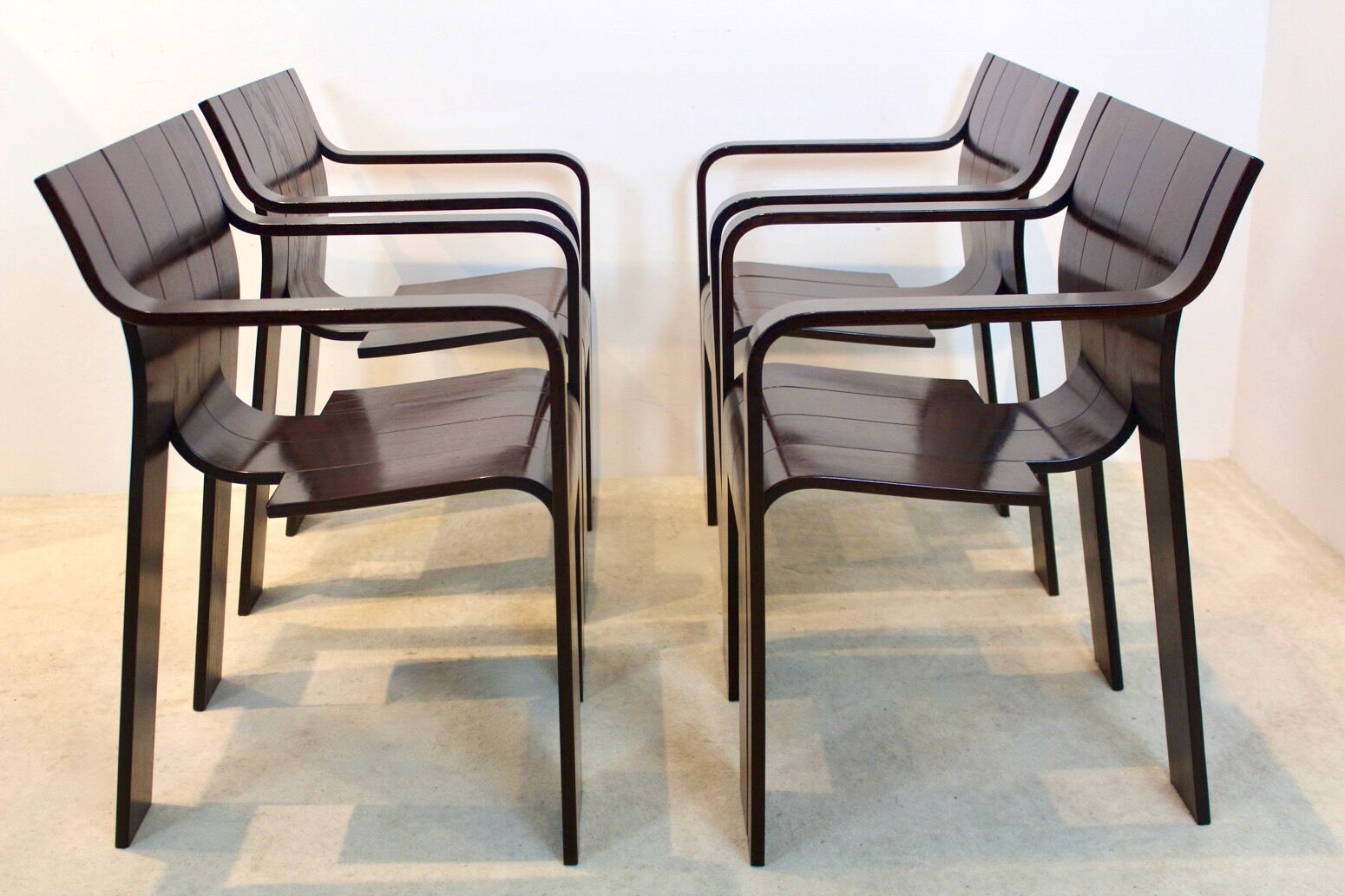Set of four Strip dining chairs with dark brown ash armrests by Gijs Bakker for Castelijn