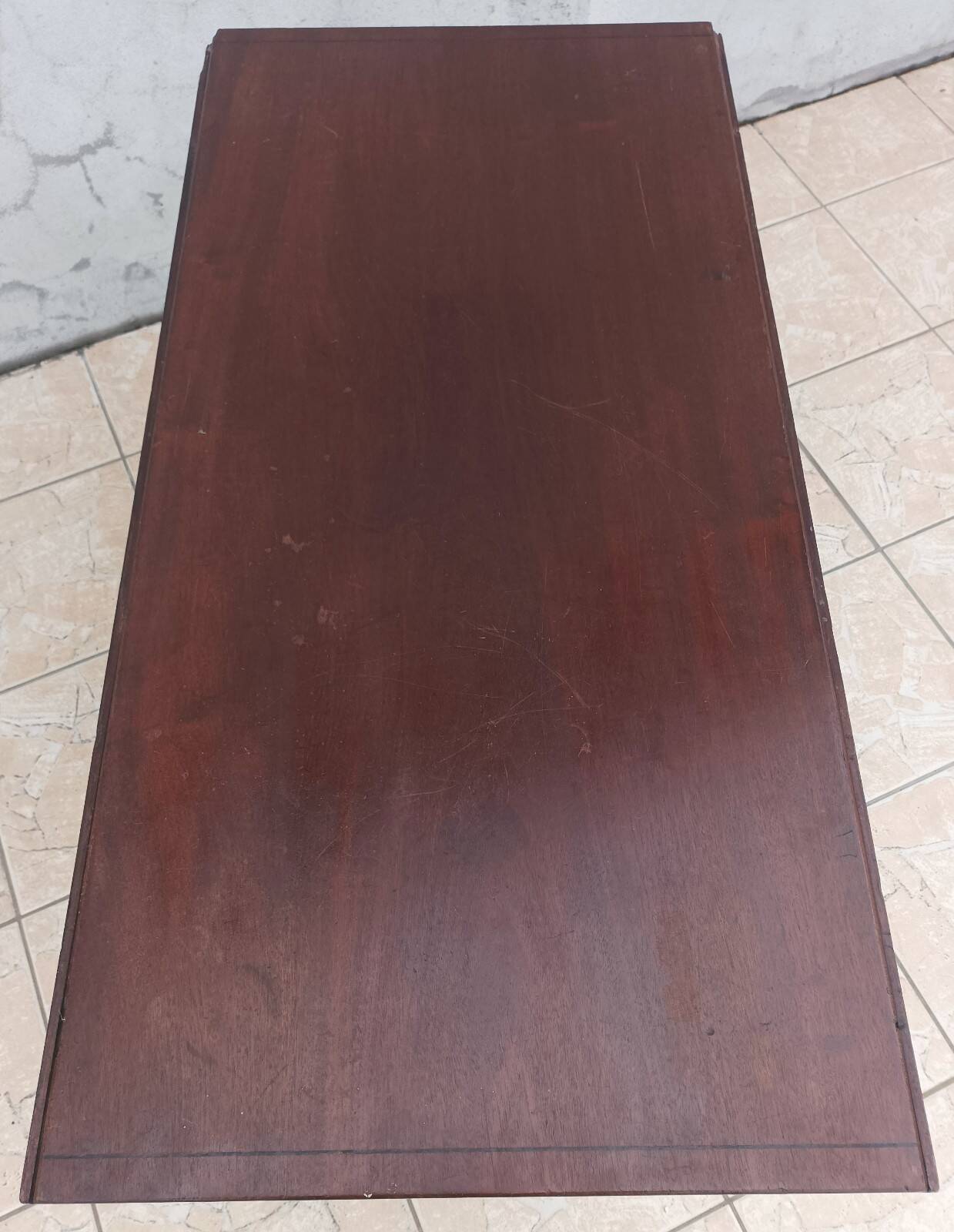 19th-century English style mahogany drop-leaf table.