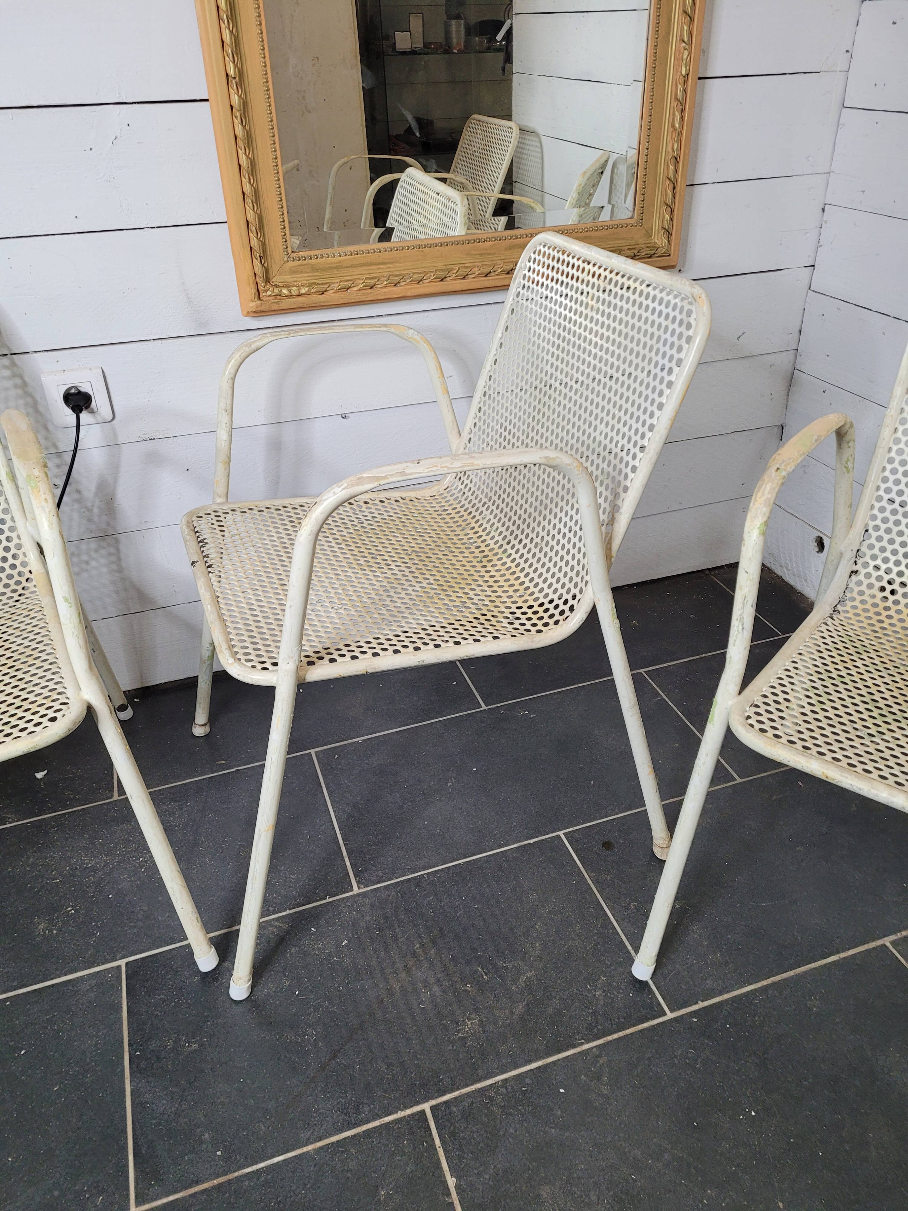 4 perforated metal garden armchairs