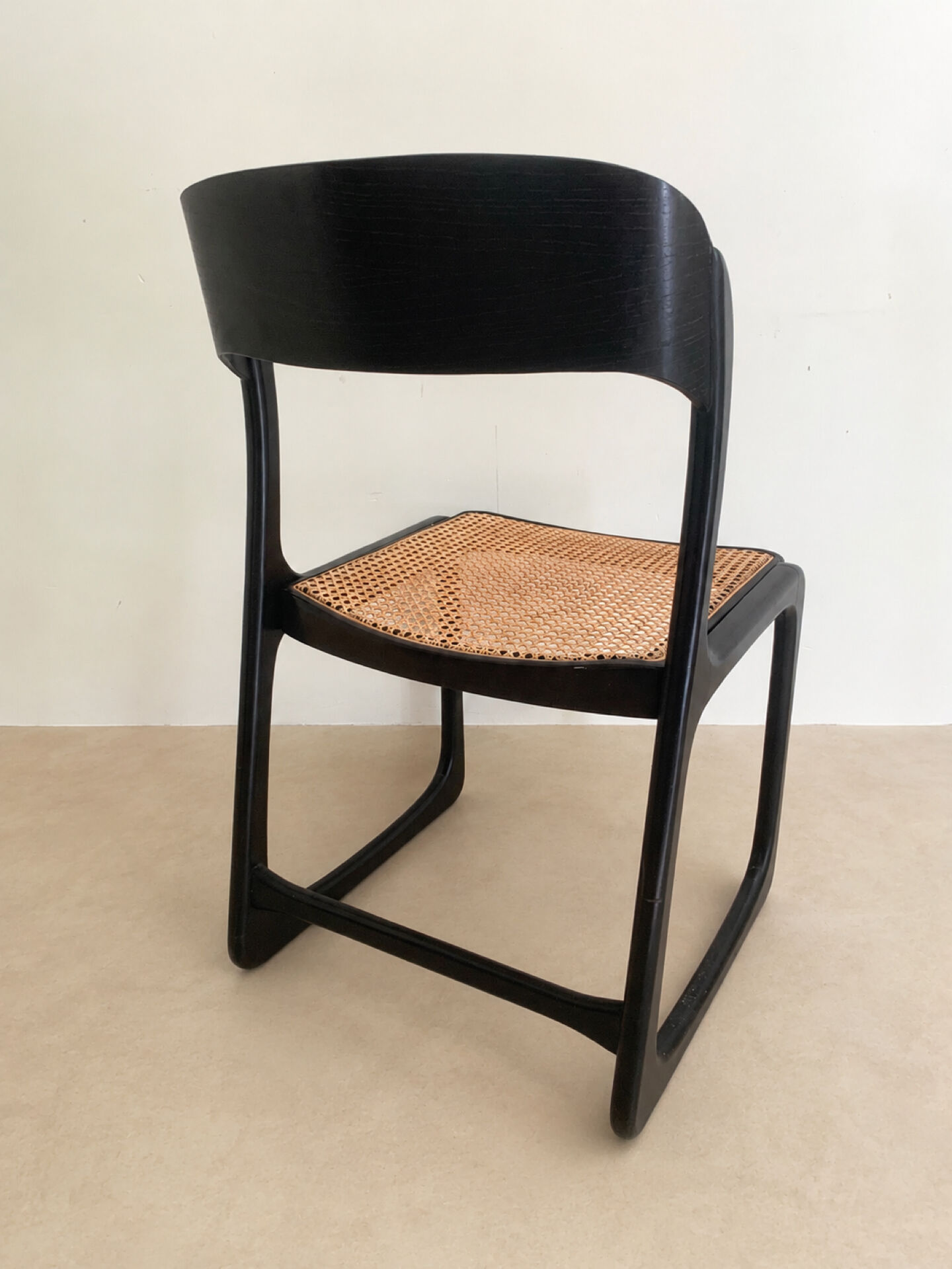 Set of 4 Baumann sled chairs with caning.