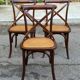 4 bistro chairs with curved wooden backs and cross braces / Crossback