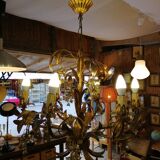 Gilded brass chandelier and silver lily of the valley bells