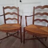 Fauteuils en bois sculpté avec accoudoirs