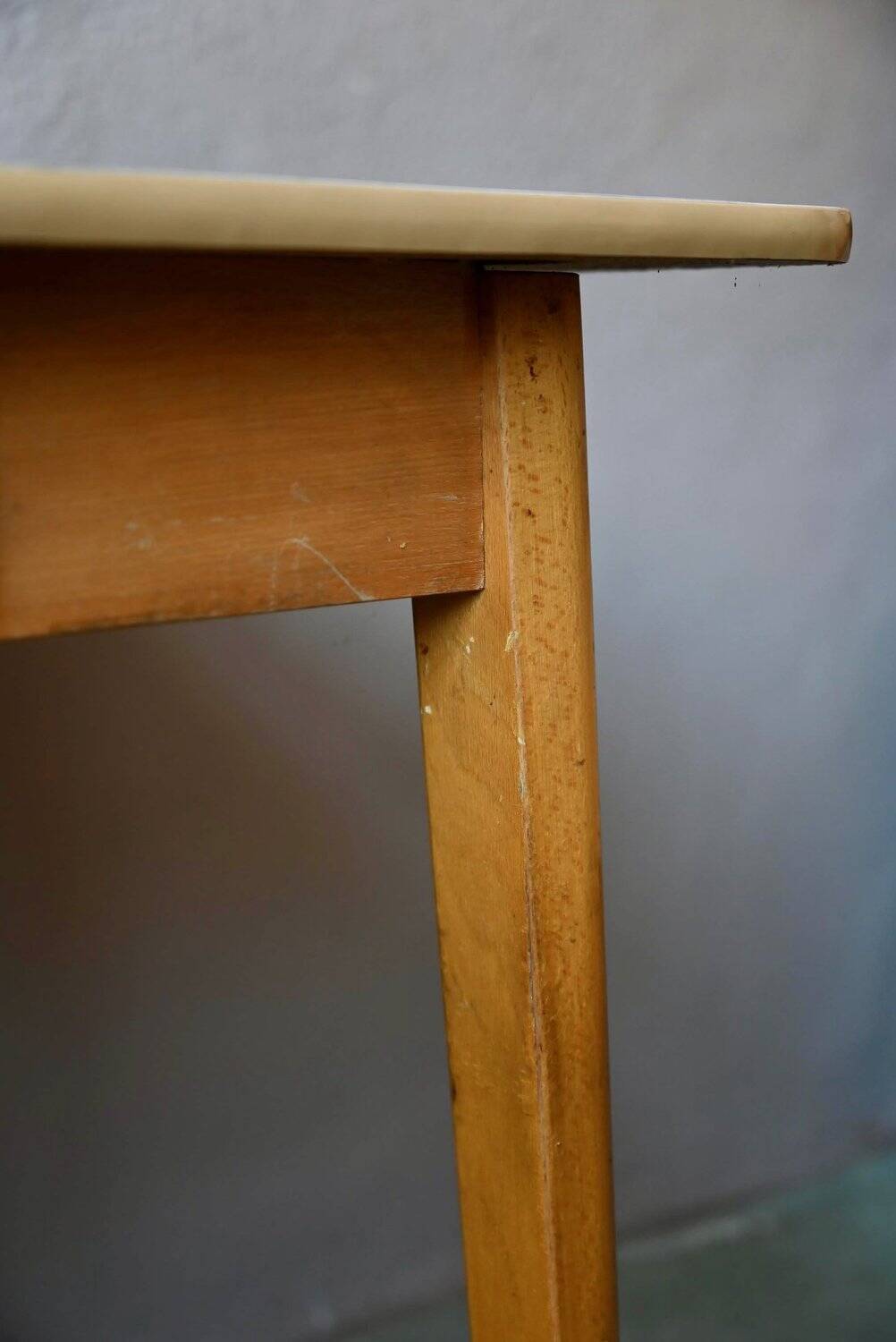 1950s Formica kitchen table with tapered legs and vintage drawer.