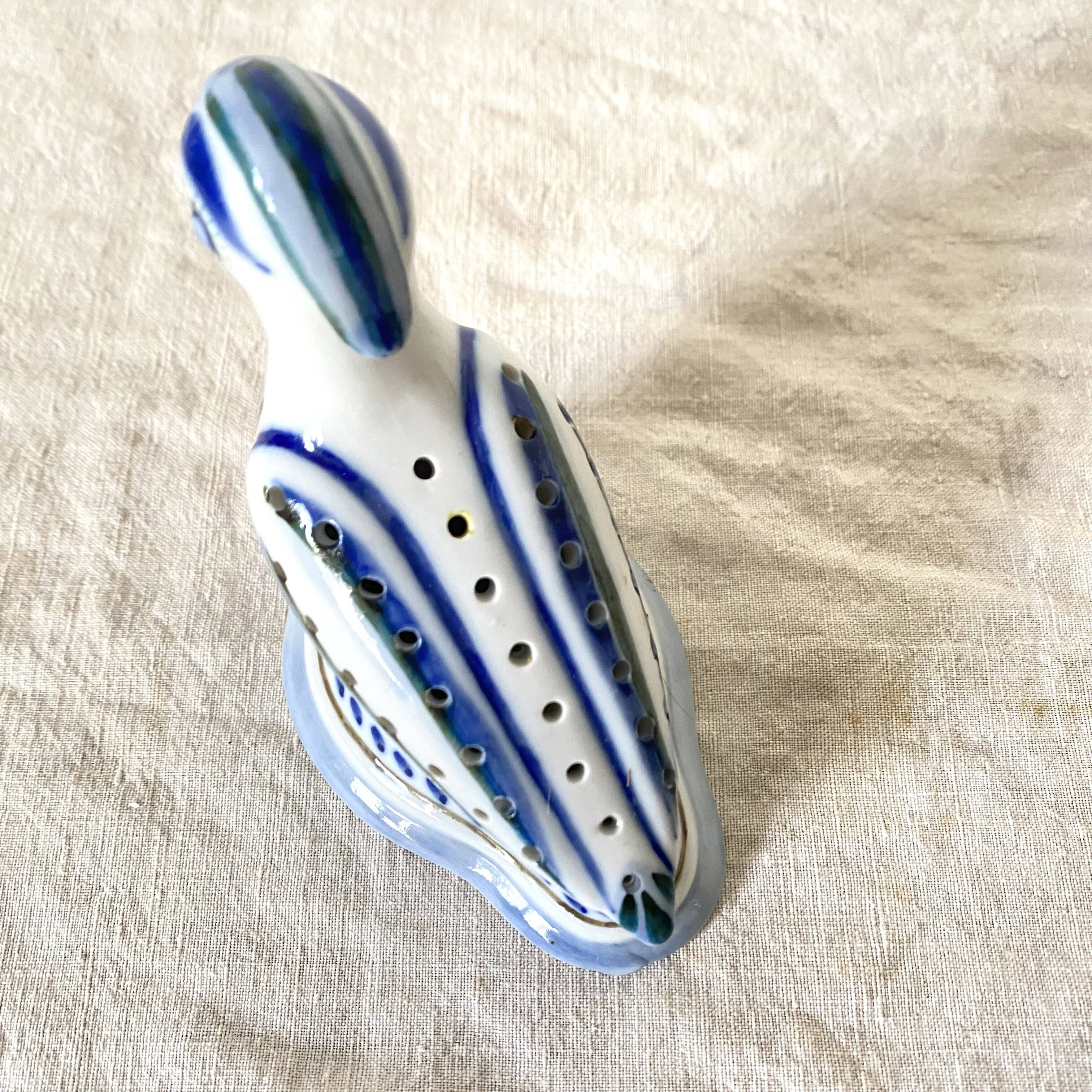 Porcelain bird, flower vase