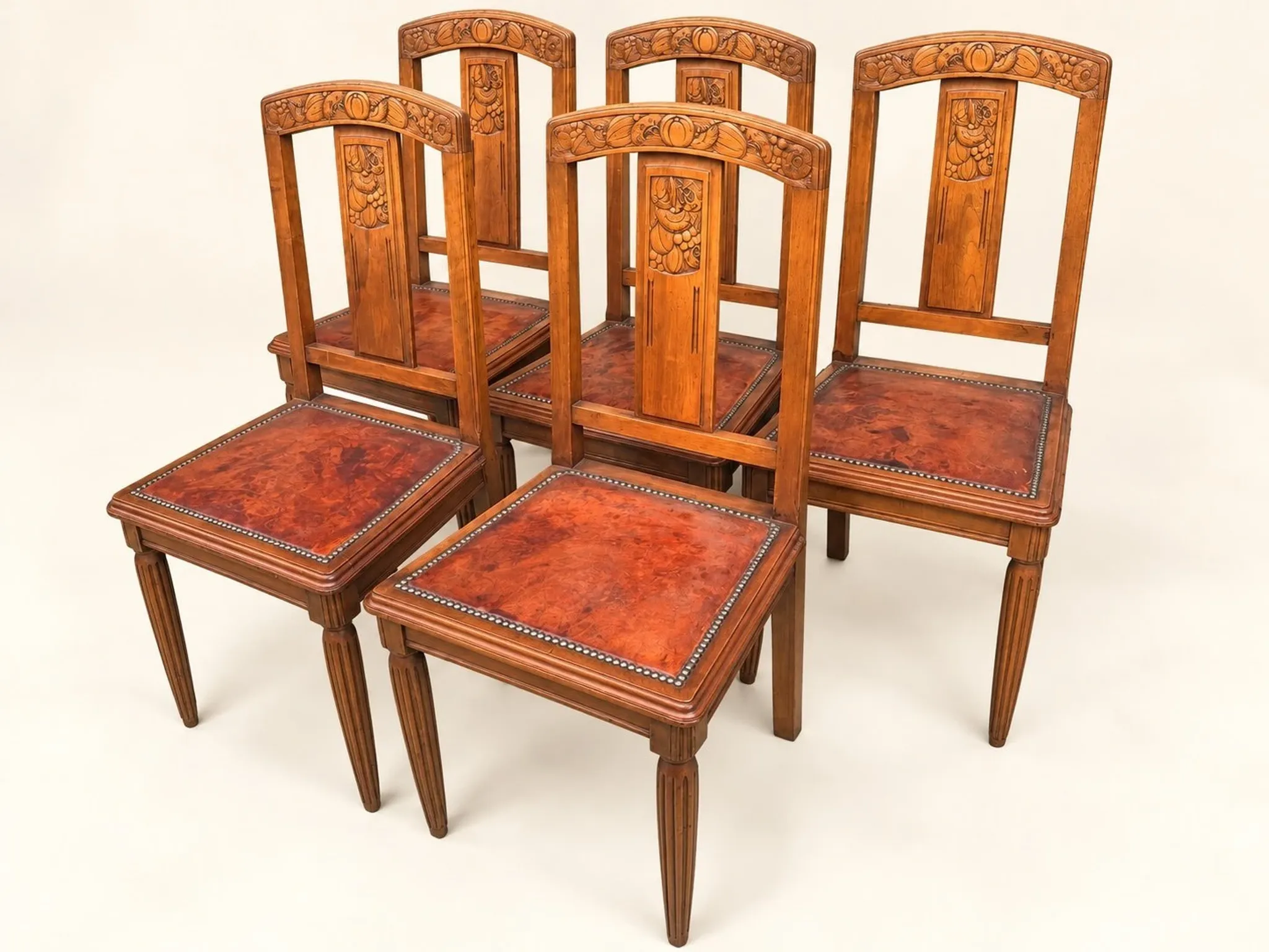5 Art Deco Chairs in Carved Walnut, Upholstered with Studded Leather – 1920s