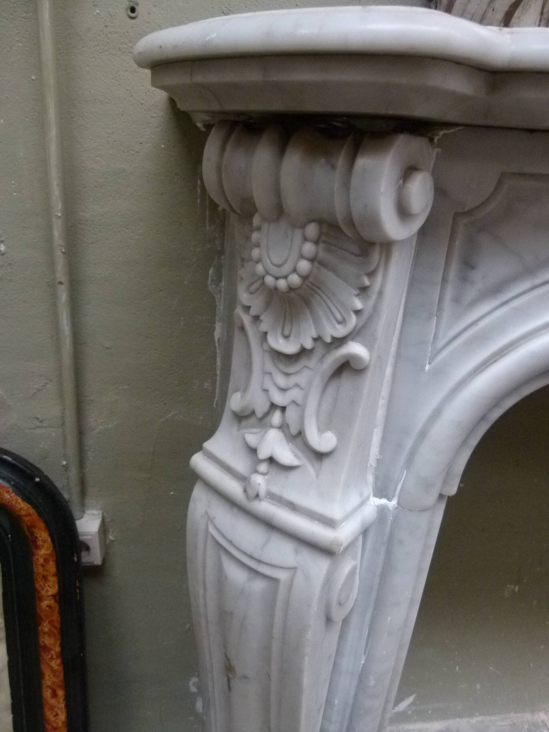 Louis XVI marble fireplace from the 19th century