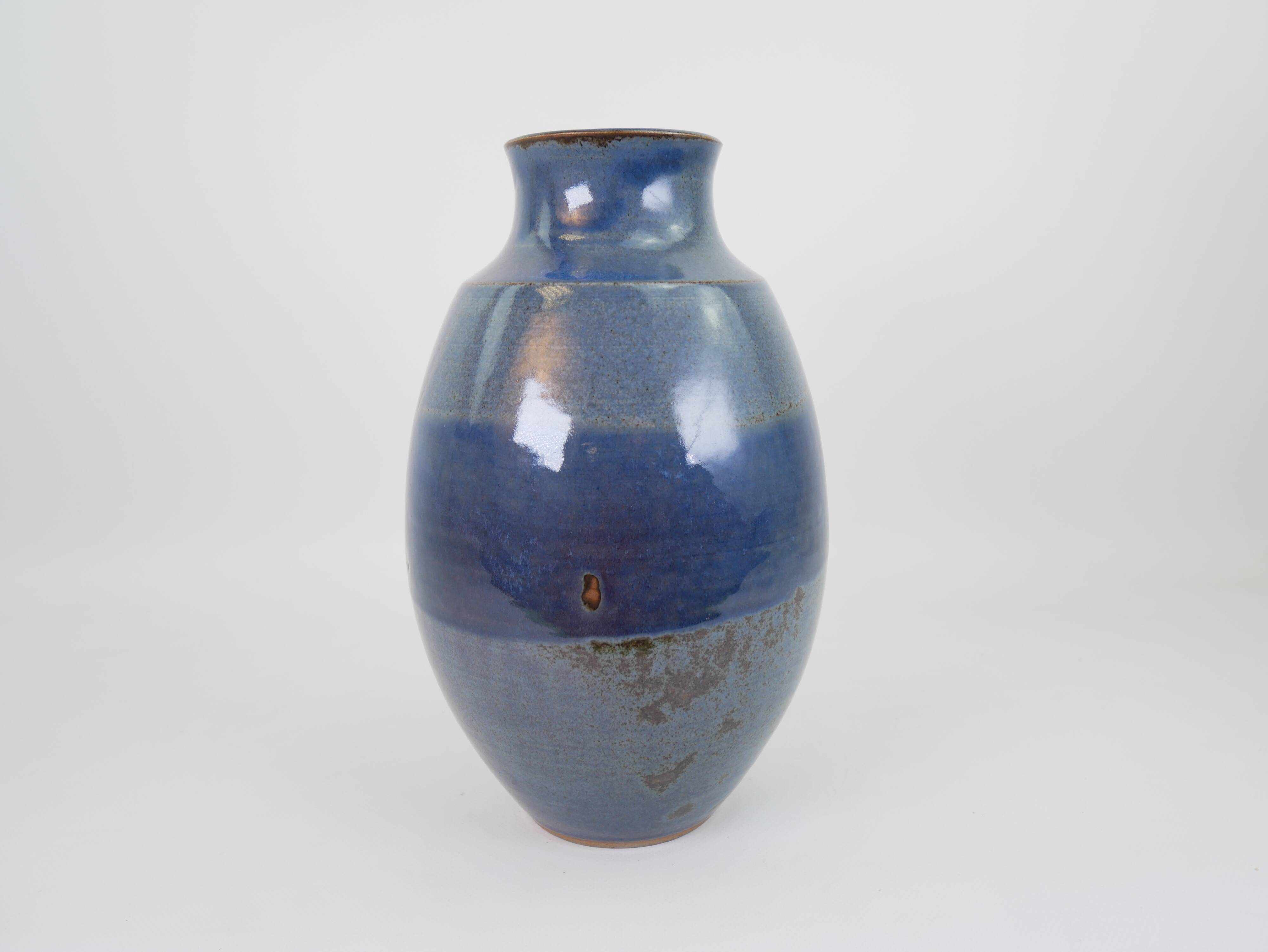 Large blue glazed ceramic vase signed under the base