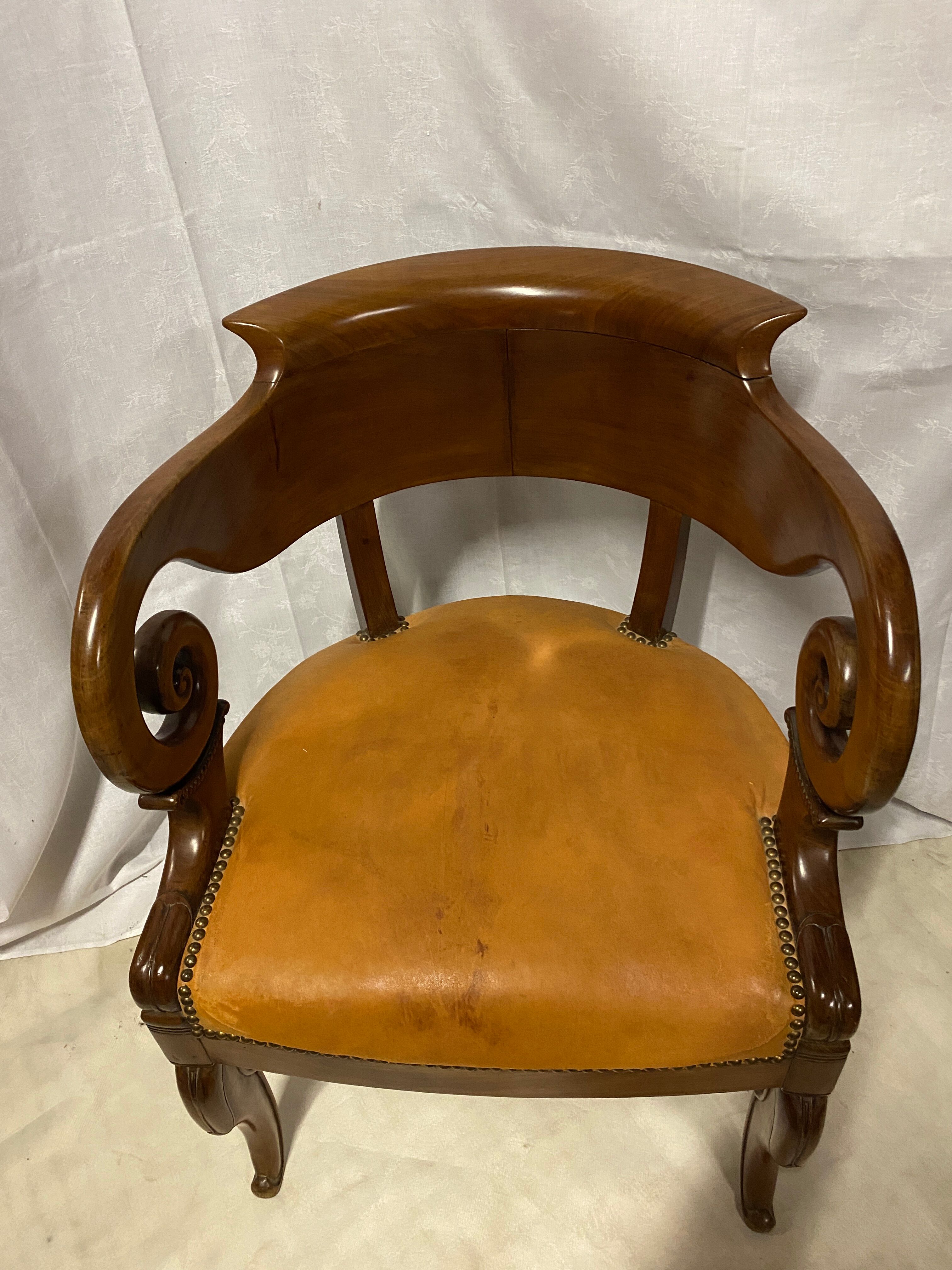 Mahogany office armchair with roll-ups